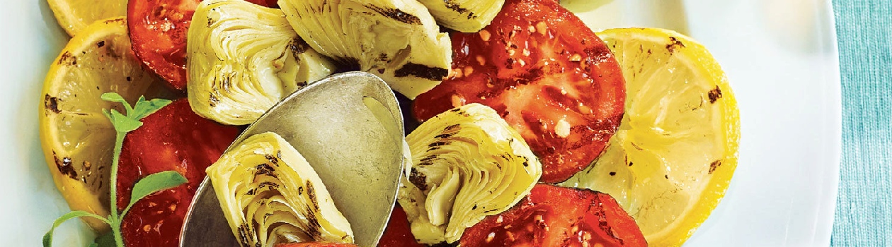 Grilled tomatoes artichokes lemons cropped