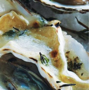 Baked oysters with brie